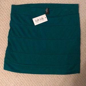 Size Medium Bandage skirt in Teal. New w/ tags.